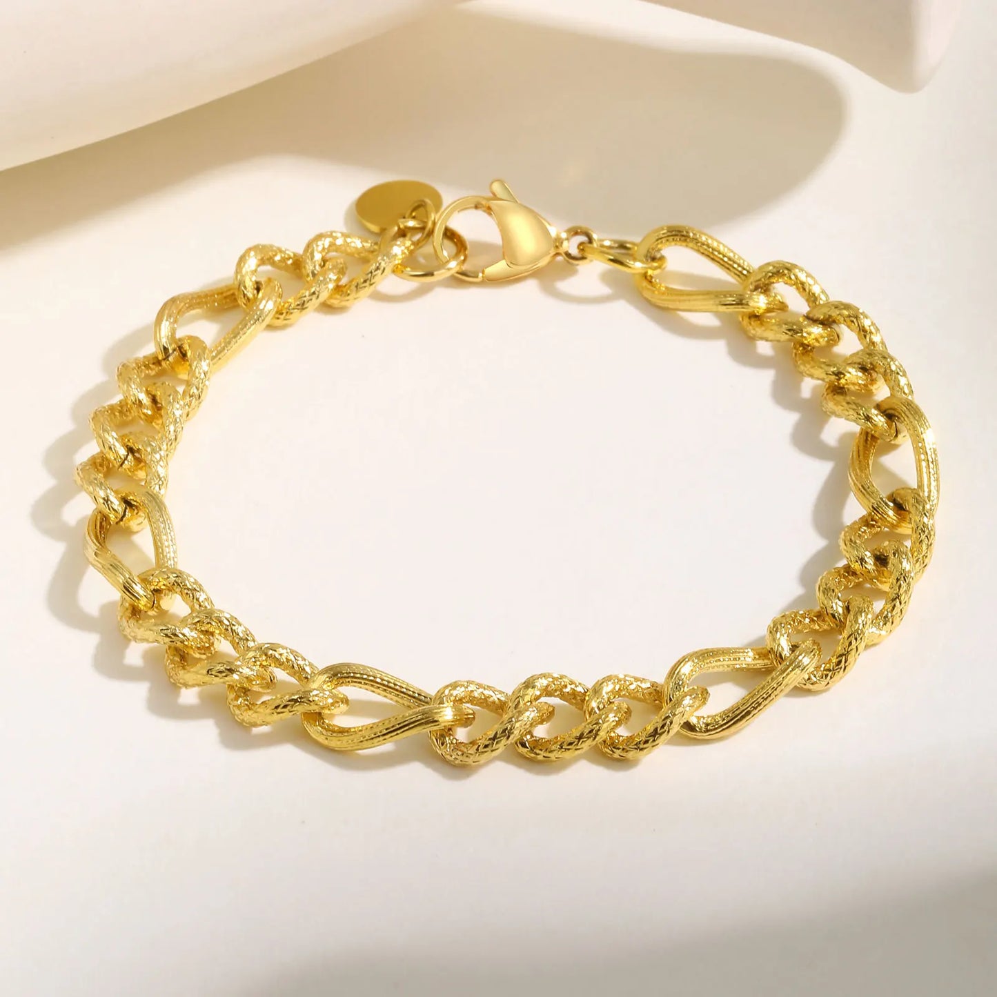 ✨ 18K Gold Plated Geometric Charm Bracelet – Stainless Steel Twist Chain for Women and Girls