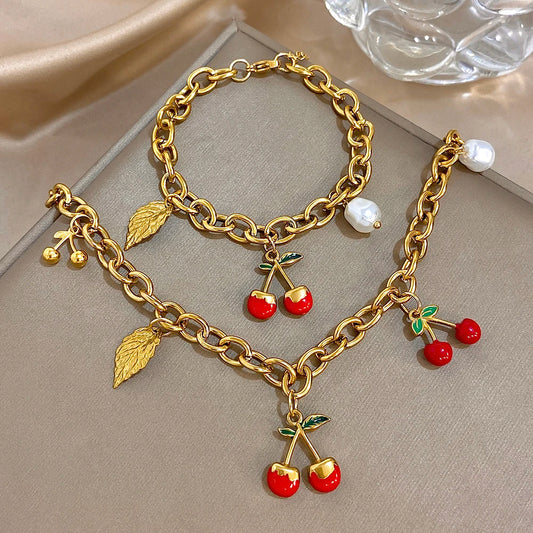 🍒 Armband/Halskette mit klobigem Charm-Set aus goldenem Kirsch- und Blattanhänger – Eleganz aus Edelstahl 